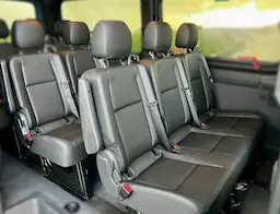 Inside standard sprniter with front facing chairs