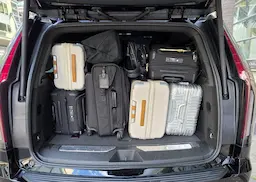 Q: How many luggage fit in a sedan? A: The picture shows 3 big luggage and 4 small